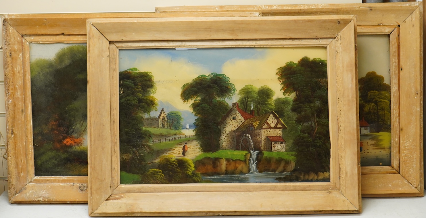 Victorian School, set of three reverse glass painted panels, Riverscapes, 38 x 59cm